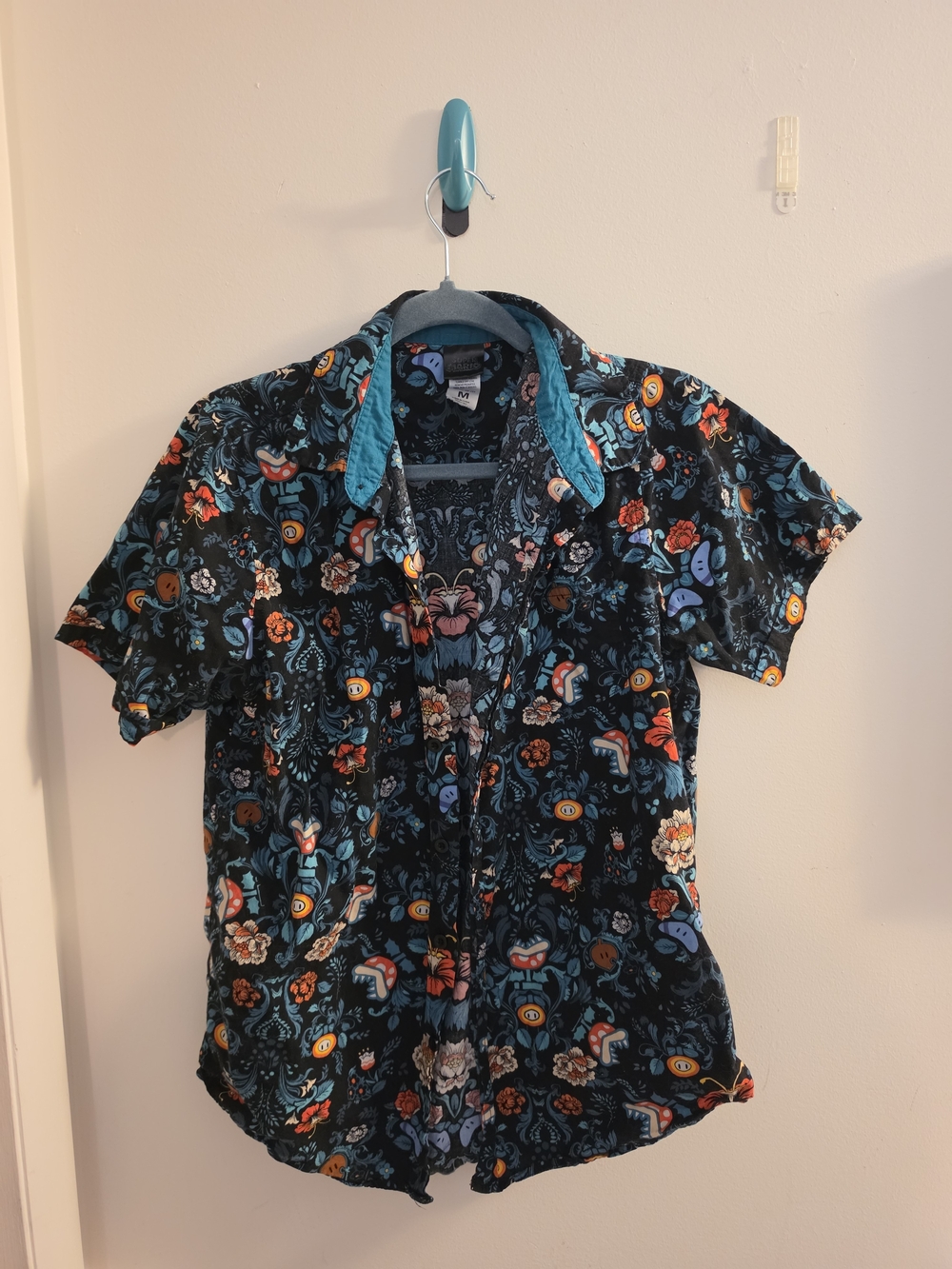 Nintendo Black Floral Button-Down Shirt with Teal Accents